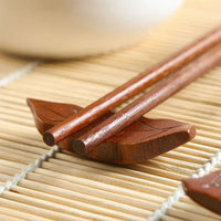 Thumbnail for Baguettes Chinoises Posées sur leur Porte Baguettes
