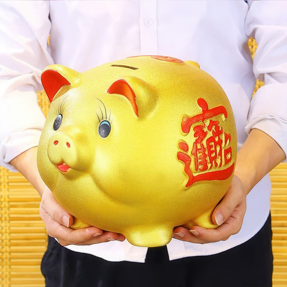 Symbole de richesse et d'abondance, le cochon d'or Feng Shui.