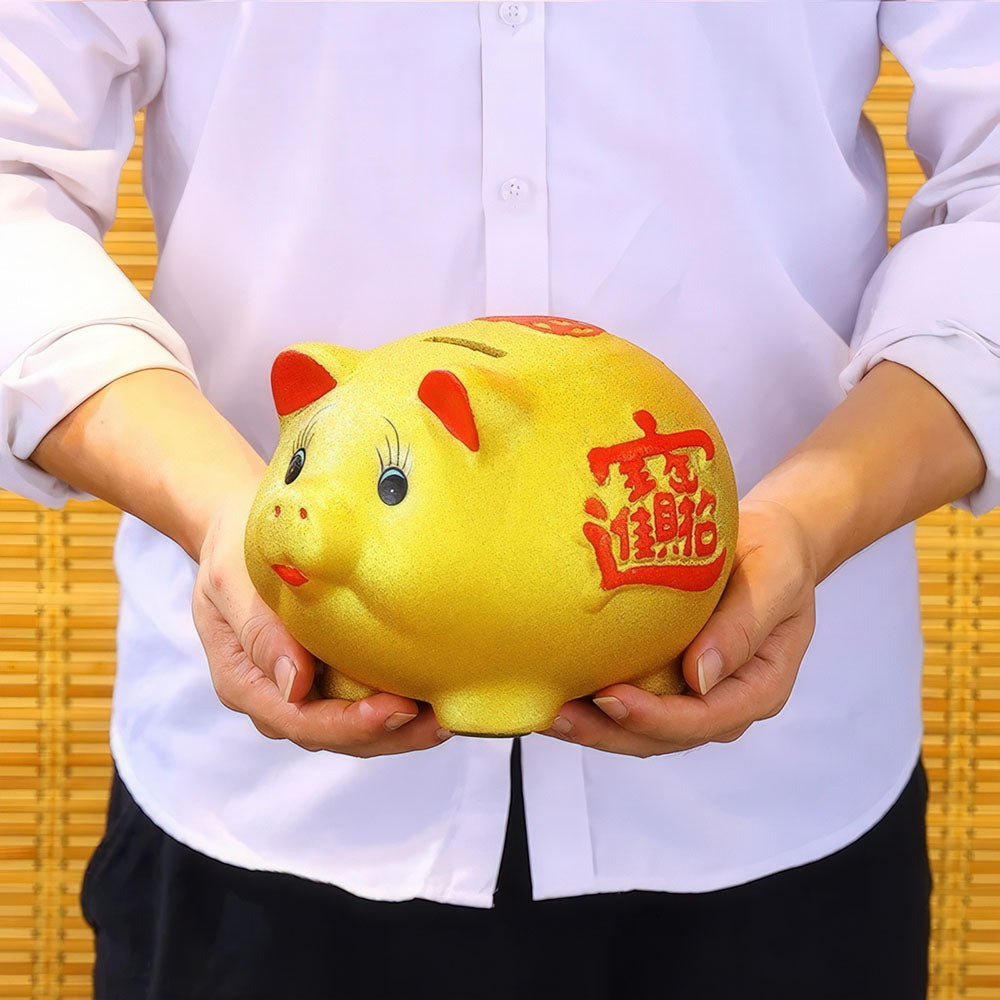 Le cochon porte-bonheur chinois doré, utilisé comme décoration Feng Shui.