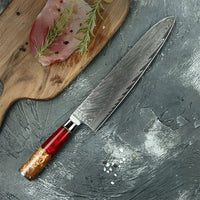 Thumbnail for Couteau à émincer en acier damas, parfait pour la préparation de viandes et poissons.