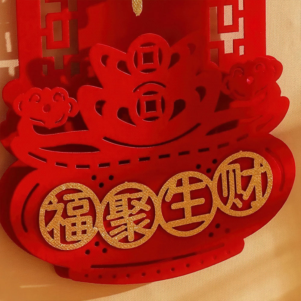 Détail de la base d'une bannière porte-bonheur chinoise avec des vœux de richesse.