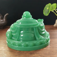 Thumbnail for Détails de la sculpture à l'arrière du Bouddha Rieur en résine.