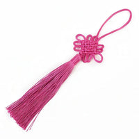 Thumbnail for Le nœud porte-bonheur chinois de couleur rose vif.