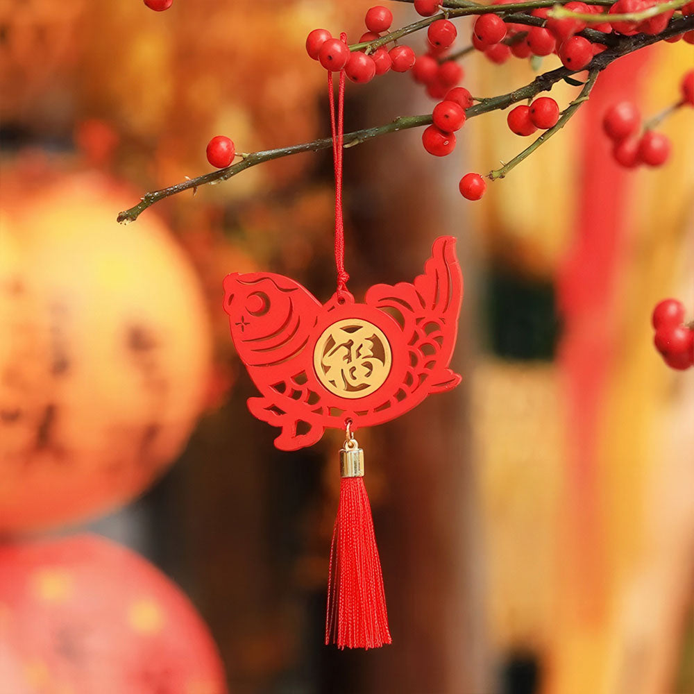 Le porte-bonheur chinois rouge en forme de poisson.
