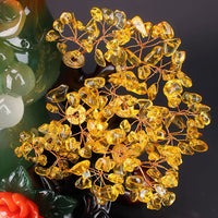 Thumbnail for Gros plan sur l'arbre de la fortune en citrine, détail de la statue porte-bonheur gourde chinoise.