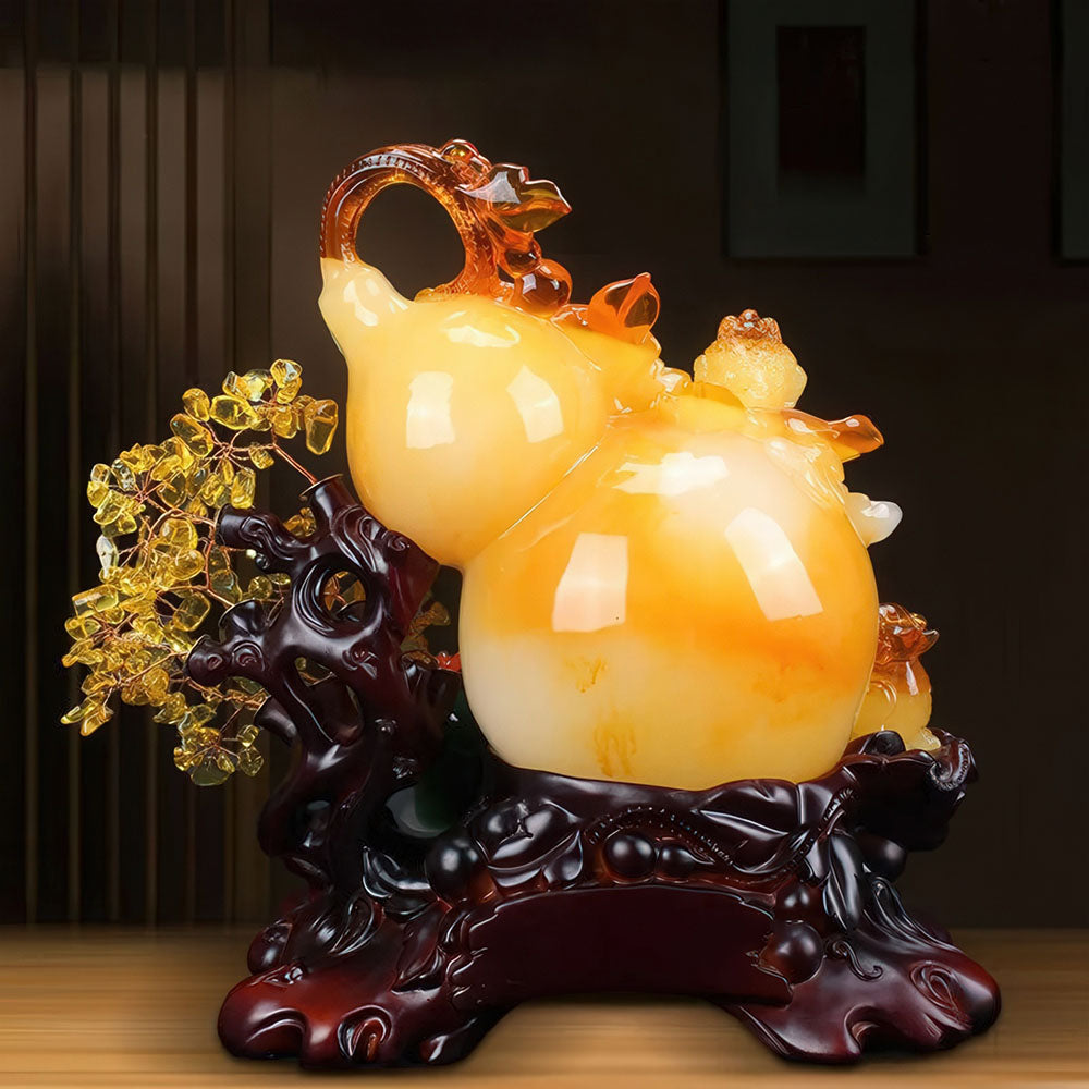 La variante jaune de la statue porte-bonheur gourde chinoise, symbole de prospérité et de santé.