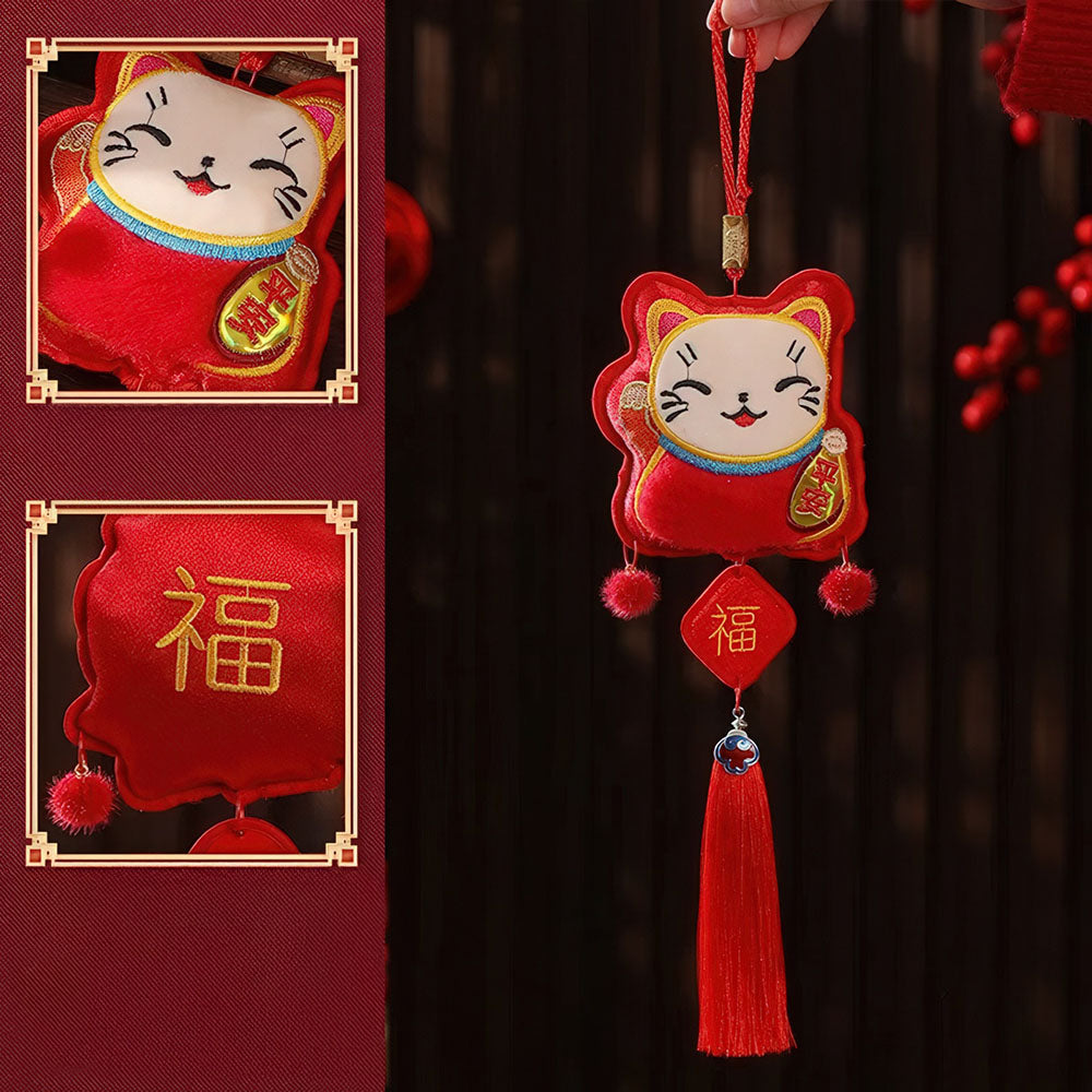 Le porte-bonheur du Nouvel An Chinois en forme de Chat de la Fortune (Maneki Neko), pour attirer la richesse.