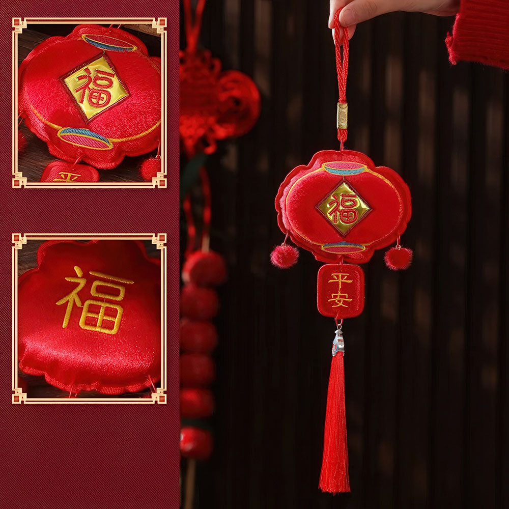 Le porte-bonheur du Nouvel An Chinois en forme de lanterne rouge, symbole de joie et de célébration.
