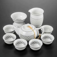 Thumbnail for Présentation du service à thé noir, incluant théière, pichet, filtre et sept tasses.