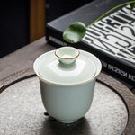 Tasse service à thé chinois blanche et dorée
