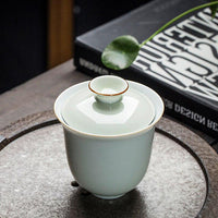 Thumbnail for Tasse service à thé chinois blanche et dorée
